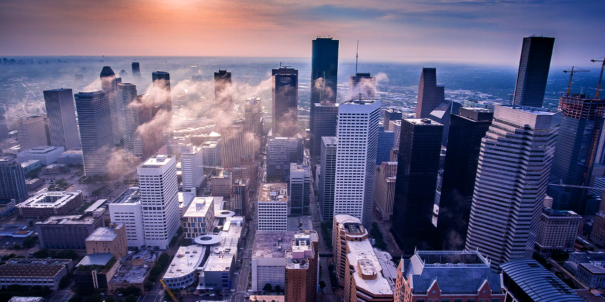 A city skyline at sunrise or sunset.