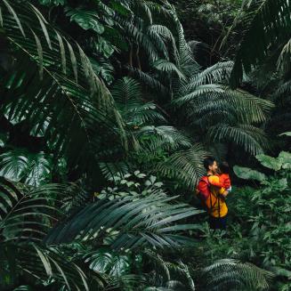father and child in forest