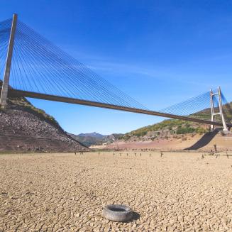 Suspension bridge over a dry lake bed
