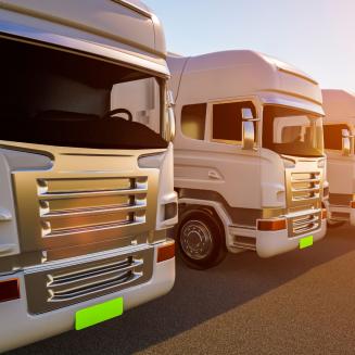 A computer generated image of a row of electric trucks