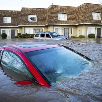 A car submerged in flood waters