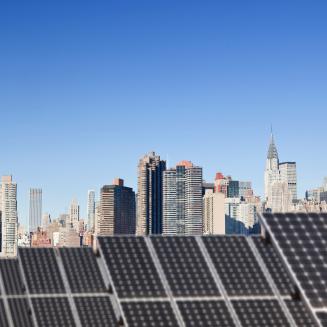Roof top solar installation with Midtown Manhattan