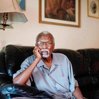 Resident Robert Taylor in a living room setting.