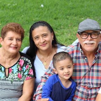 Family of four posing for a picture