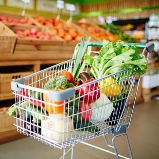 Shopping cart filled with fruits and vegetables