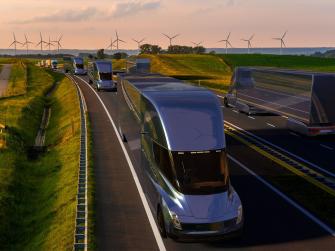 Artist's rendering of electric trucks on highway with wind turbines in background