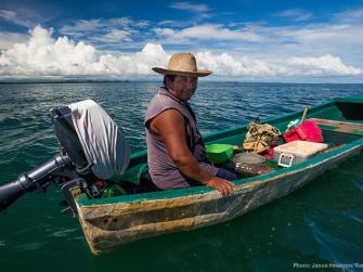 Belizean fisherman Yonardo Cus on fishing boat