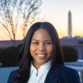 Nya with the Washington Monument in the background at sunset